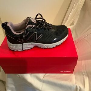 New Balance Woman’s trail running sneakers. Size 10W